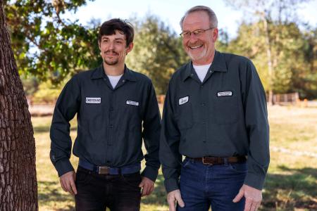 Two men smiling for a picture